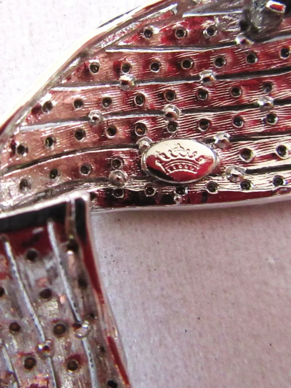 Clear pave rhinestone free form ribbon brooch in silver tone setting